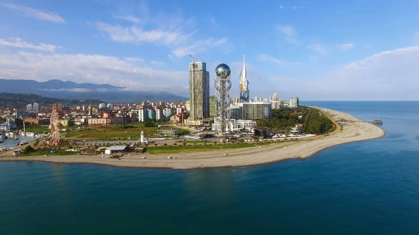 Buildings standing on seacoast of Batumi Georgia, aerial view from sea, resort